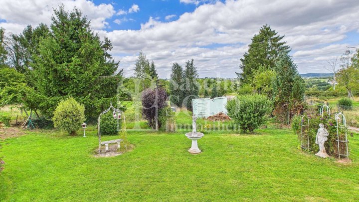 Charmantes Einfamilienhaus mit Terrasse, großem Garten und Weitblick in ruhiger Lage von Merchweiler