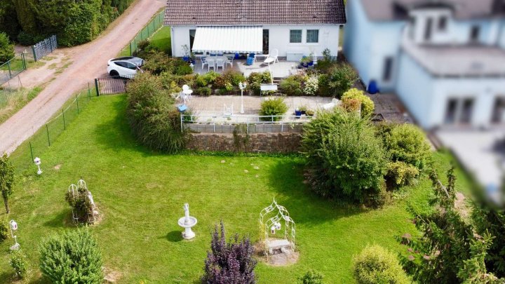 Charmantes Einfamilienhaus mit Terrasse, großem Garten und Weitblick in ruhiger Lage von Merchweiler