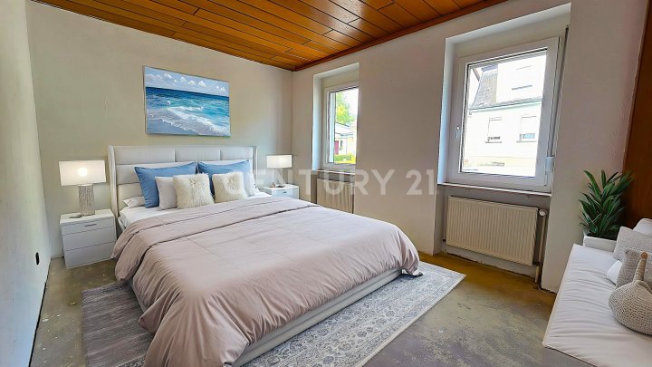 Sehr attraktives 1-2 Familienhaus, MFH mit großen Balkonen, Doppelgarage und Garten in SB- Scheidt