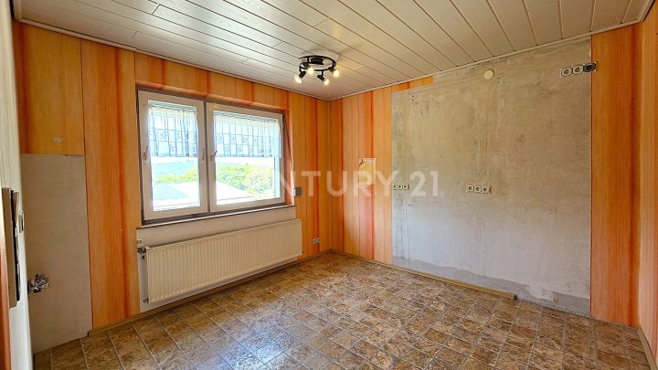 Charmantes 1-2 Familienhaus mit Garten und Doppelgarage in privilegierter Wohnlage von NK - Furpach