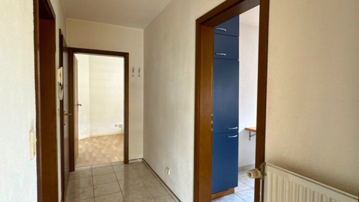 Gepflegte 2 ZKB-Wohnung mit EBK, Terrasse, Garten + Stellplatz in toller Lage in SLS - Picard