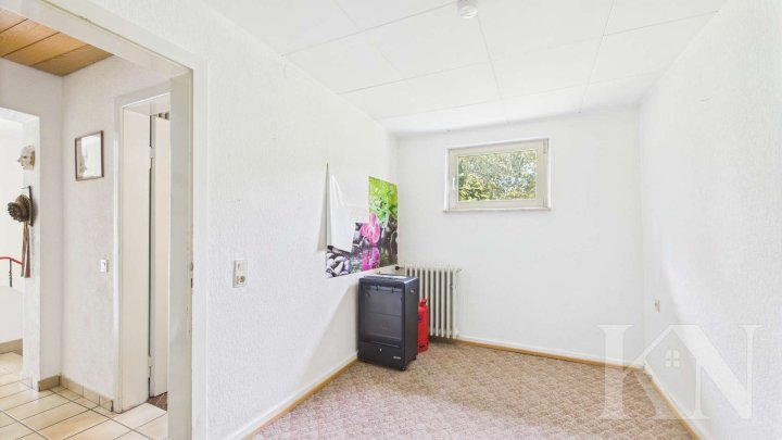 Doppelhaushälfte mit großem Garten, Grillhütte & Baugrundstück – seltene Gelegenheit!