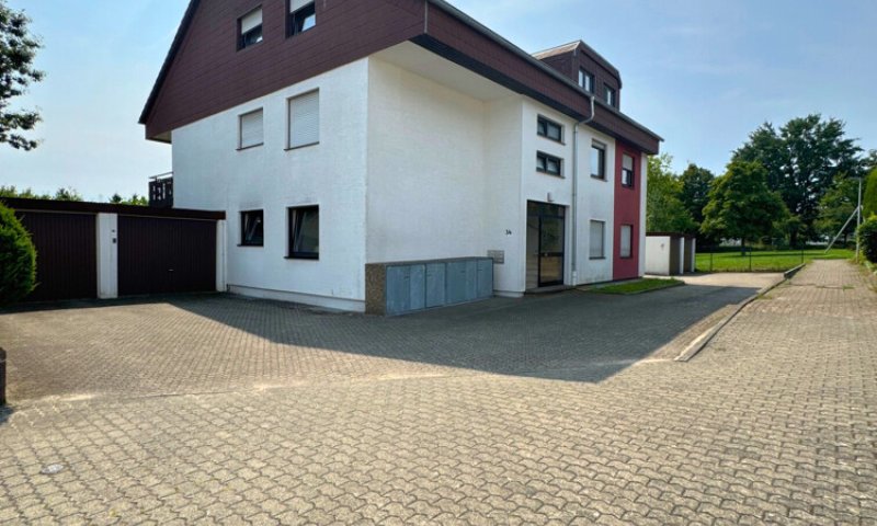 Gepflegte 2 ZKB-Wohnung mit EBK, Terrasse, Garten + Stellplatz in toller Lage in SLS - Picard