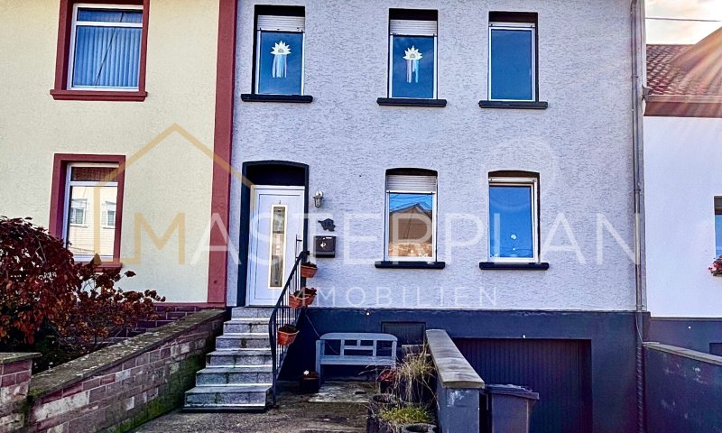 Gemütliches Einfamilienhaus mit Garten, Terrasse und Garage in ruhiger Lage