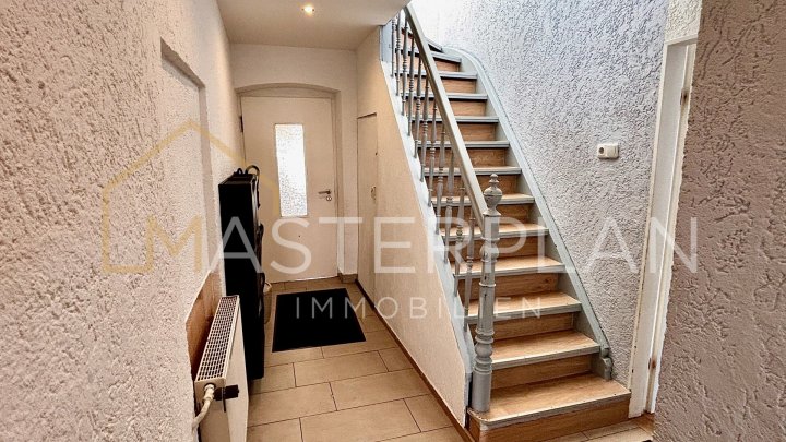 Gemütliches Einfamilienhaus mit Garten, Terrasse und Garage in ruhiger Lage