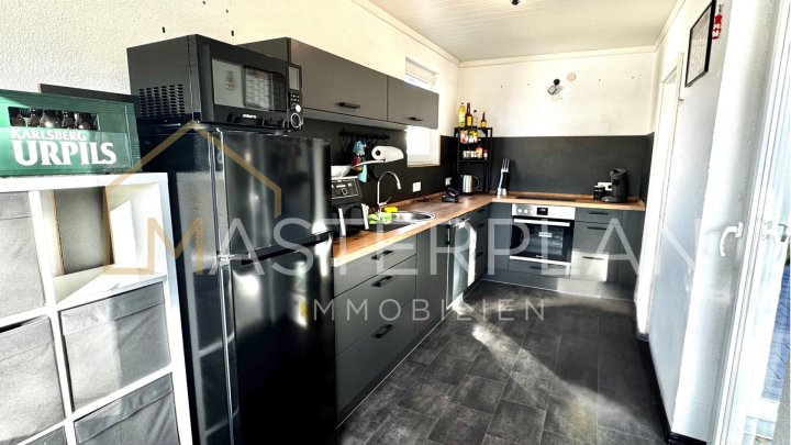 Eigentumswohnung im Erdgeschoss mit Terrasse und Garten