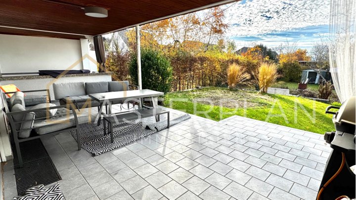 Eigentumswohnung im Erdgeschoss mit Terrasse und Garten