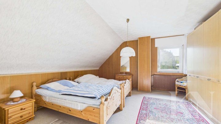 Zentral gelegenes Zuhause mit Potenzial – Doppelhaushälfte in Köllerbach