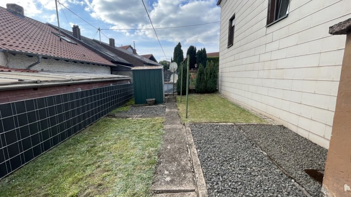 Familienfreundliches Einfamilienhaus mit Garten und Stellplatz