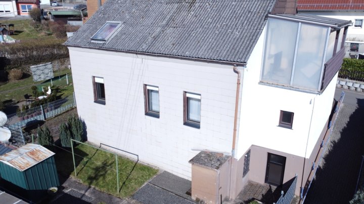 Familienfreundliches Einfamilienhaus mit Garten und Stellplatz