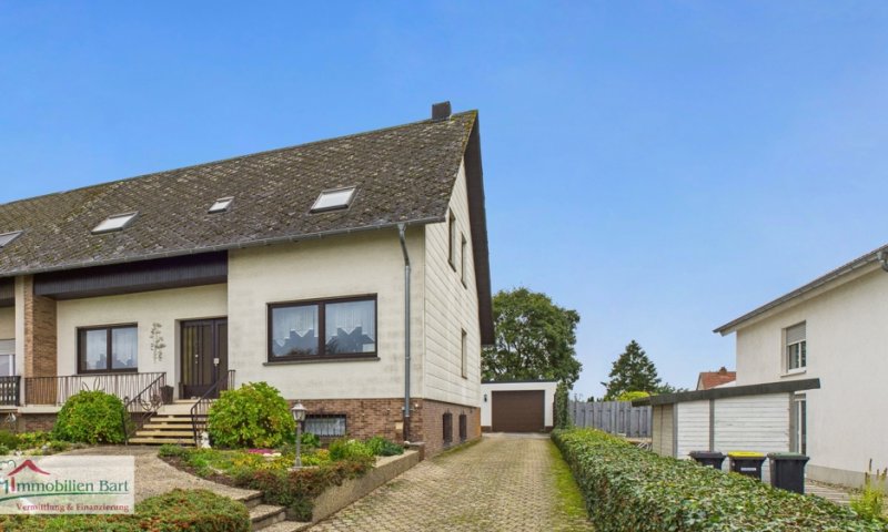 ZWEIFAMILIENHAUS MIT GARAGEN UND GARTEN BEI ORSCHOLZ