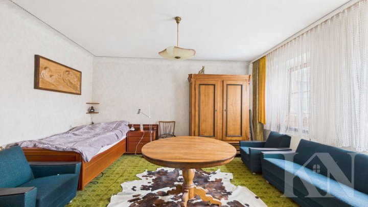 Einfamilienhaus mit Scheune und Ausbaupotenzial in Marpingen-Urexweiler!