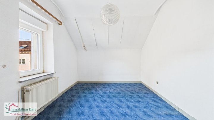 MERZIG: WOHNHAUS MIT GARTEN UND GARAGE IN ZENTRALER LAGE!