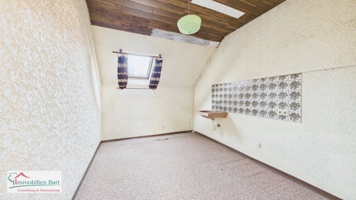 MERZIG: WOHNHAUS MIT GARTEN UND GARAGE IN ZENTRALER LAGE!