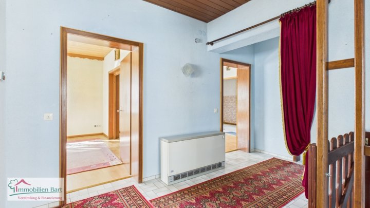 ZWEIFAMILIENHAUS IN TOP LAGE VON ORSCHOLZ