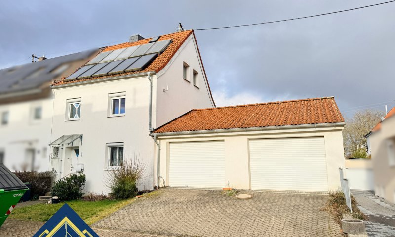 Doppelhaushälfte in Bestlage von Saarlouis mit Doppelgarage und schönem Grundstück zu verkaufen