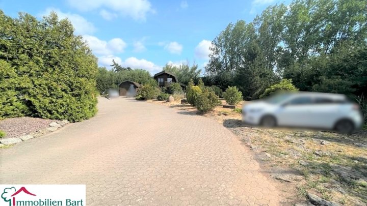 WOHNHAUS + BÜRO + 375 M² AUSSTELLUNG AUF 40 AR IN TOP LAGE!