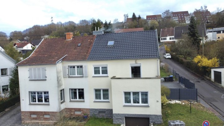 Modernisiertes Einfamilienhaus in zentraler Lage von Merzig mit Garten und Garage