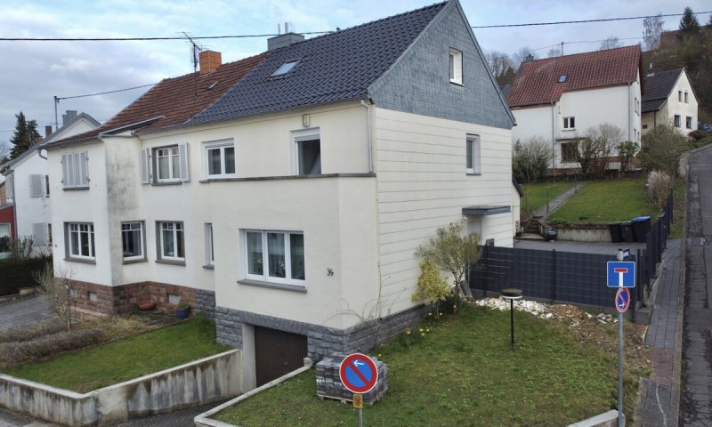 Modernisiertes Einfamilienhaus in zentraler Lage von Merzig mit Garten und Garage
