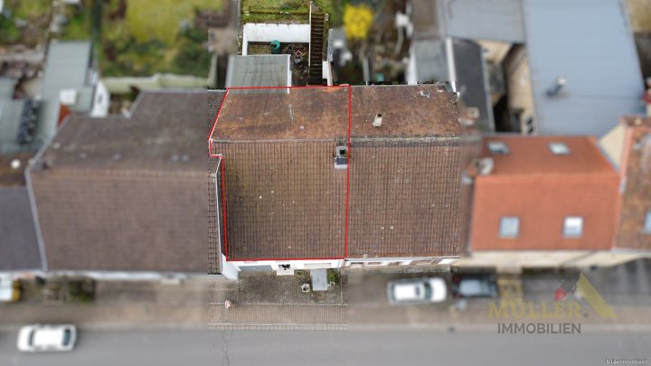 Reihenmittelhaus mit viel Potenzial und großen Garten sucht neuen Besitzer