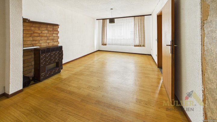 Reihenmittelhaus mit viel Potenzial und großen Garten sucht neuen Besitzer