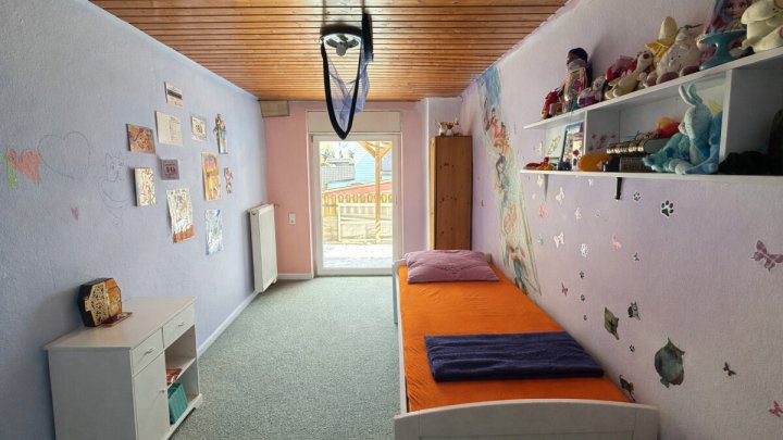 Doppelhaushälfte mit Garten und Stellplatz - mit Renovierungsbedarf