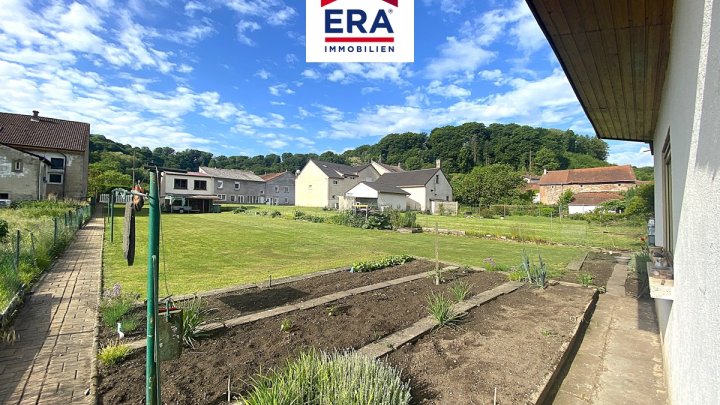 EIN-, BIS ZWEIFAMILIENHAUS MIT BAULAND, FREISTEHEND IN DALEM/FR, NÄHE SLS