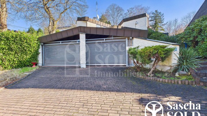 Architekturjuwel mit Galerie, Terrassen und kreativer Seele in ruhiger Bestlage von Dudweiler