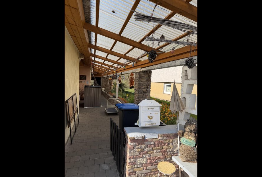 Überdachung Zugang + Sitzecke