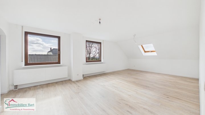 GRENZNÄHE: 2 WOHNEINHEITEN MIT GARAGEN UND GARTEN IN TOP WOHNLAGE