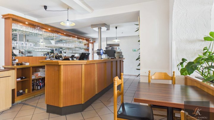 Renditeobjekt in Völklingen-Geislautern: Wohn- und Geschäftshaus mit Restaurant und 3 Wohneinheiten