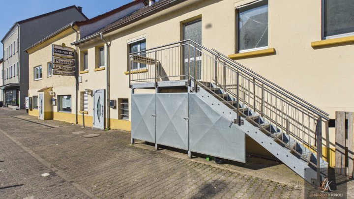 Renditeobjekt in Völklingen-Geislautern: Wohn- und Geschäftshaus mit Restaurant und 3 Wohneinheiten