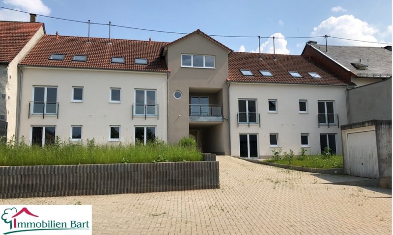 NEUBAU IN SONNIGER LAGE MIT TERRASSE, GARTEN UND GARAGE!