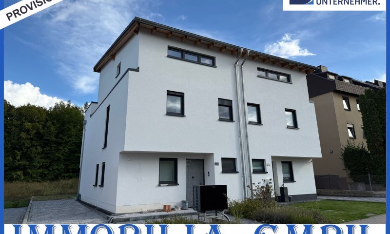Neubau-Doppelhaushälfte in Zweibrücken: Wohnen am Jacobyberg im modernen Stil mit Garten