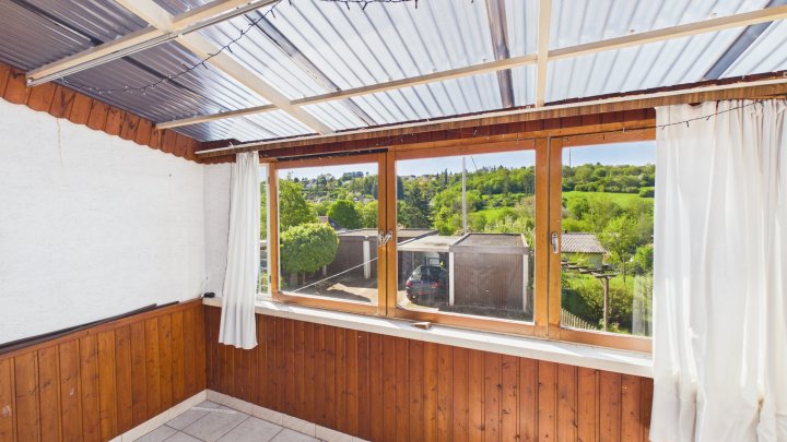 Wohnhaus mit Weitblick - Einfamilienhaus mit Entwicklungspotential in Merchweiler